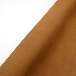 Peau de chèvre. Cuir finition mat. Teinte Taupe.