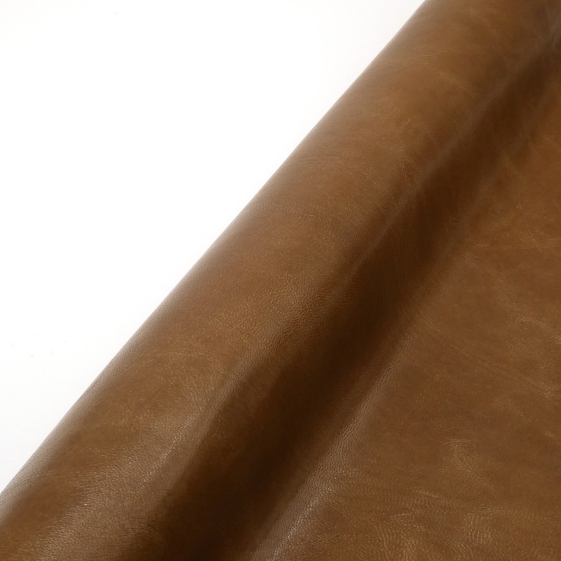 Peau de chèvre. Cuir finition satiné. Teinte Cappuccino.