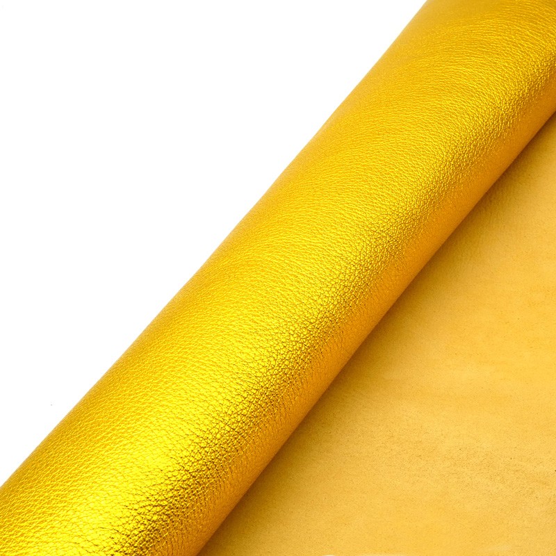 Peau de chèvre Fantaisie. Cuir métallisé et grainé. Teinte Or Jaune
