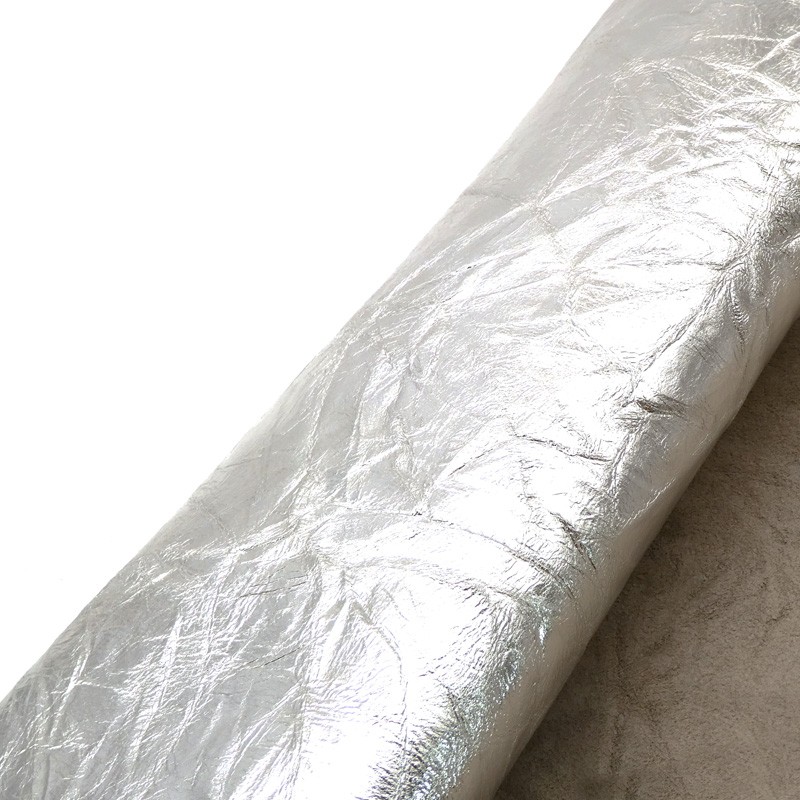 Peau de chèvre Fantaisie. Cuir métallisé et foulloné. Teinte Argenté