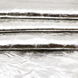 Peau de chèvre Fantaisie. Cuir métallisé et foulloné. Teinte Argenté